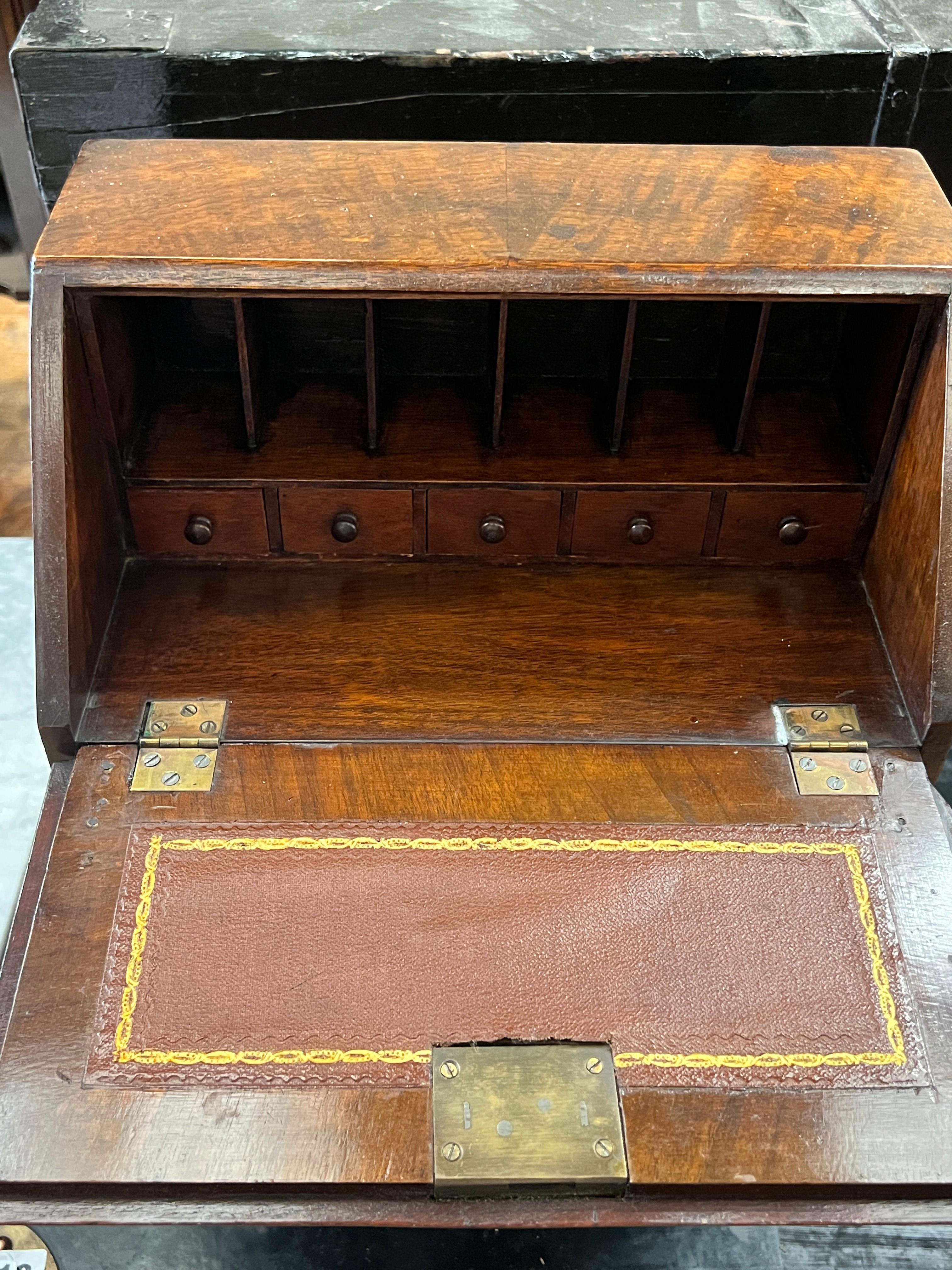 A miniature George III style banded mahogany bureau, width 31cm, depth 19cm, height 36cm